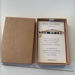 Demdaco adjustable “Your Journey” bracelet.